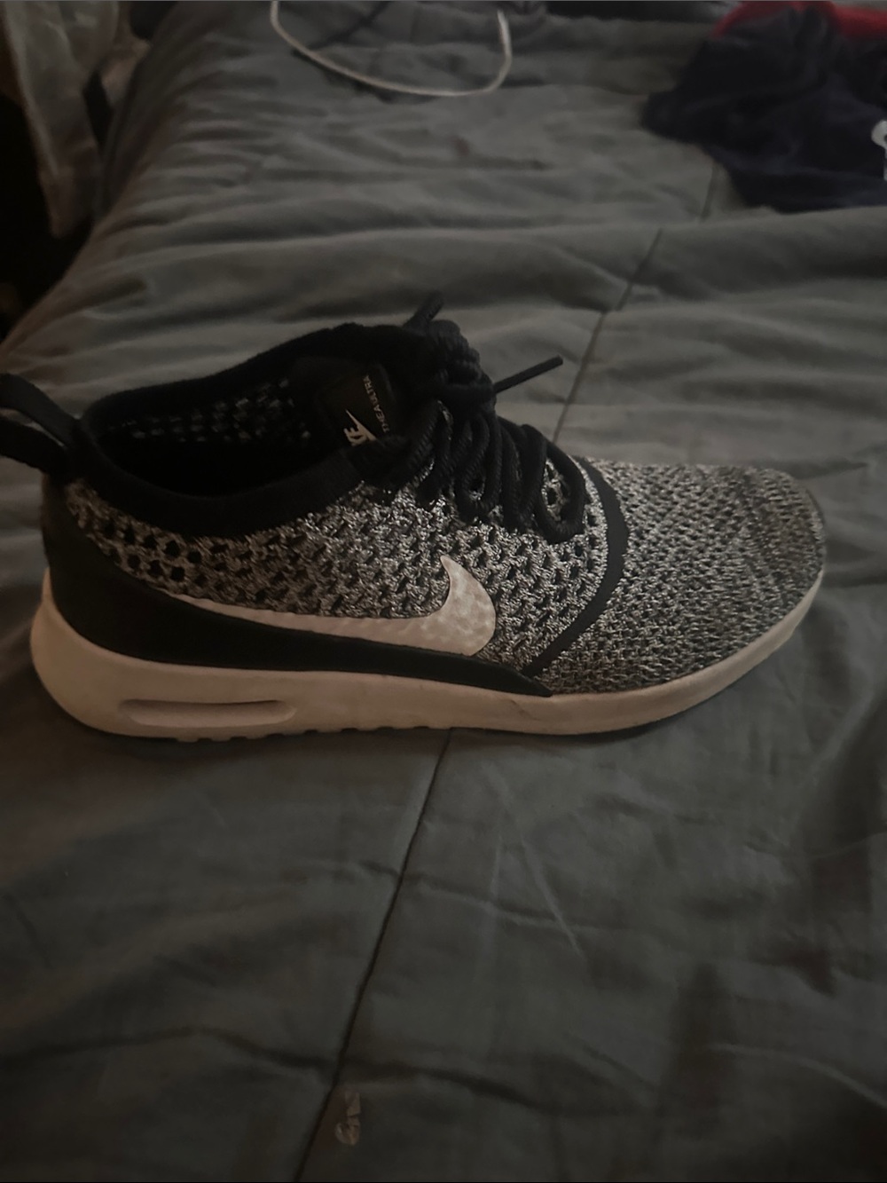 Nike Women’s Black and White Flyknit Casual Sneaker